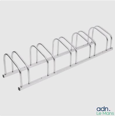 a close up of a rack with a bunch of bikes on it