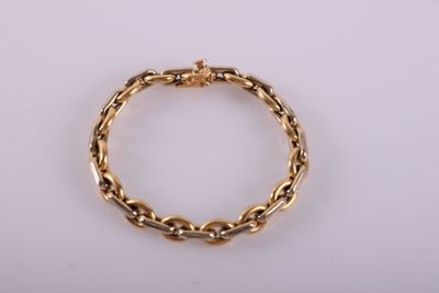 a gold bracelet with a chain link on a white background