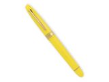 a yellow ballpoint pen sitting on top of a white surface