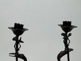 two candles that are sitting on top of a table