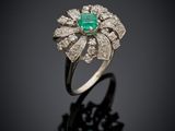 an emerald and diamond ring
