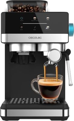 a close up of a coffee machine with a cup of coffee