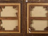 two wooden frames that have been cut out of wood