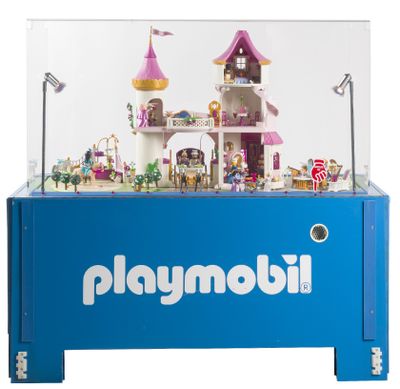 une boîte bleue contenant un ensemble Playmobil