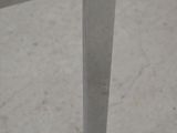 a close up of a metal frame on the floor