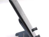 a close up of a cell phone on a stand