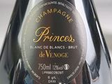 a bottle of champagne on a table with a label on it