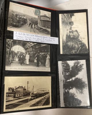 an old photo of a train station with pictures on it