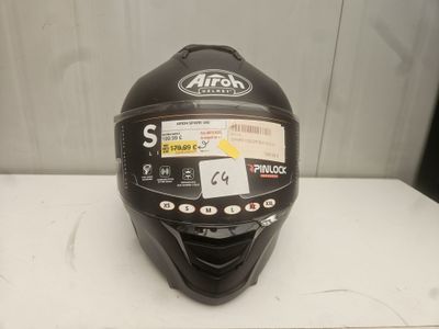 an image of a helmet on a table with a tag on it