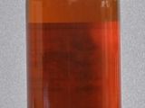 a bottle of liquor that is sitting on a table