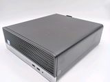 an image of a small computer on a white surface