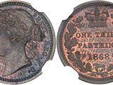 a close up of a coin with an image of a woman on it
