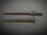 two knives on a gray surface with a black background
