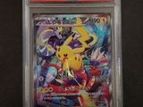 a close up of a pokemon card on a black surface