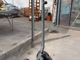 a small hand truck that is parked in a building