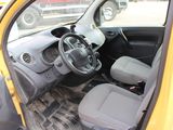 a small yellow car with a steering wheel and a dashboard