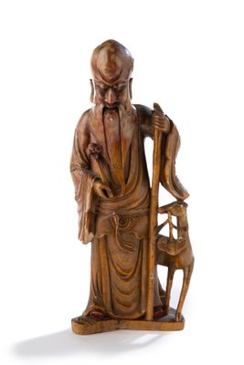 statue représentant un vieil homme avec un chien et une chaise