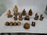 a lot of figurines that are on a table