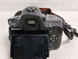a digital camera that is sitting on a table