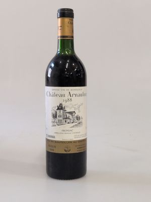 a bottle of wine that is sitting on a table