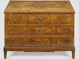 une image représentant une commode en bois surmontée de tiroirs