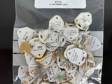 a bag of assorted jewelry on a table