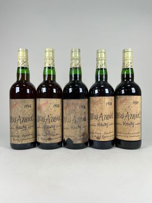 four bottles of old wine are lined up in a row