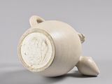 an image of a ceramic vase with a turtle on it