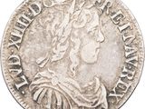 a close up of a coin on a white background