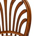 an image of a wooden chair with a wicker seat and back