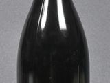a bottle of wine that is sitting on a table