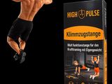 a man doing a pull up with a bar in front of a box