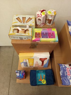 several boxes of food are stacked on top of each other on the floor