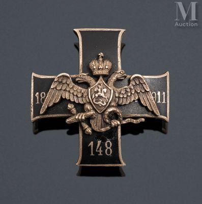 an image of a cross with a crown and two birds on it