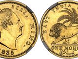 a gold sovereign coin with a lion and palm tree on it