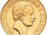 l'image d'une pièce d'or sur laquelle figure le visage d'un homme
