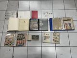 a lot of books and stamps on the floor