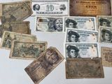 a lot of old paper money on the table
