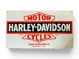 a close up of a motorcycle sign on a white wall