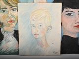 three paintings of a woman and a boy are on a table