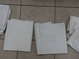 many pieces of paper on the floor next to each other