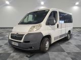 a white van that is parked in a room