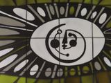 a picture of a clock on the wall of a building