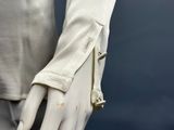 an image of a mannequin hand with a ring on it ' s finger