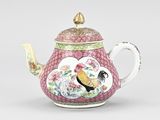 an image of a pink teapot with a rooster on it