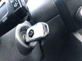 a close up of a car ' s dashboard with a key lock