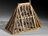 an image of a model of a wooden structure on a white surface