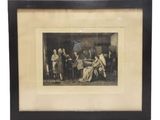 une vieille photo d'un groupe de personnes assises autour d'une table