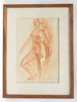 painting of a nude woman in a brown frame on a white wall