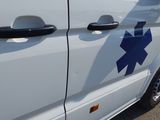 a white van with a blue star on the side of it